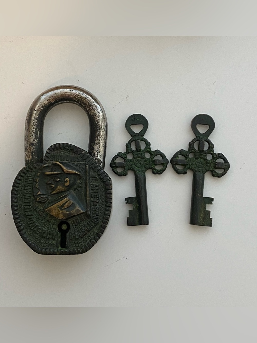 Antique brass padlock with a relief by Sir Thomas Blamey,